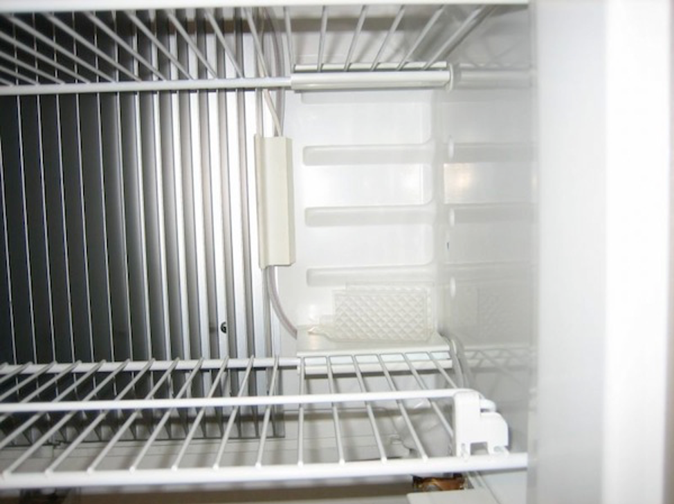 A picture containing appliance, indoor, white goods, wall

Description automatically generated