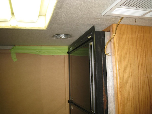 A picture containing indoor, wall, cabinet

Description automatically generated